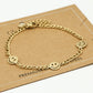 Armband smileys goudkleurig