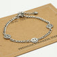 Armband smileys zilverkleurig