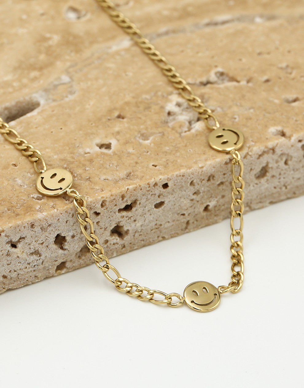 Schakelketting smileys goudkleurig