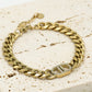 Armband DD met strass goudkleurig