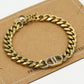 Armband DD met strass goudkleurig