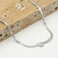 Ketting plat met hartje zilverkleurig