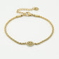 Gedraaide armband smiley goudkleurig