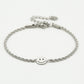 Gedraaide armband smiley zilverkleurig