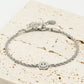 Gedraaide armband smiley zilverkleurig