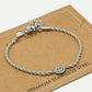 Gedraaide armband smiley zilverkleurig
