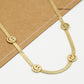 Ketting snake met smileys goudkleurig