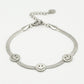 Armband met 3 smileys zilverkleurig