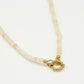 Kralenketting met slotje beige
