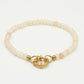Kralenarmband met slotje beige