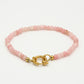 Kralenarmband met slotje roze