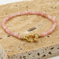 Kralenarmband met slotje roze