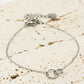 Armband 2 open rondjes verbonden zilverkleurig