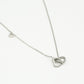 Ketting dubbele hartjes met bedel zilverkleurig