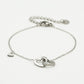 Armband dubbele hartjes met bedel zilverkleurig
