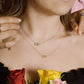 Ketting 2 open rondjes verbonden goudkleurig