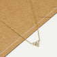 Ketting steentjes driehoek goudkleurig