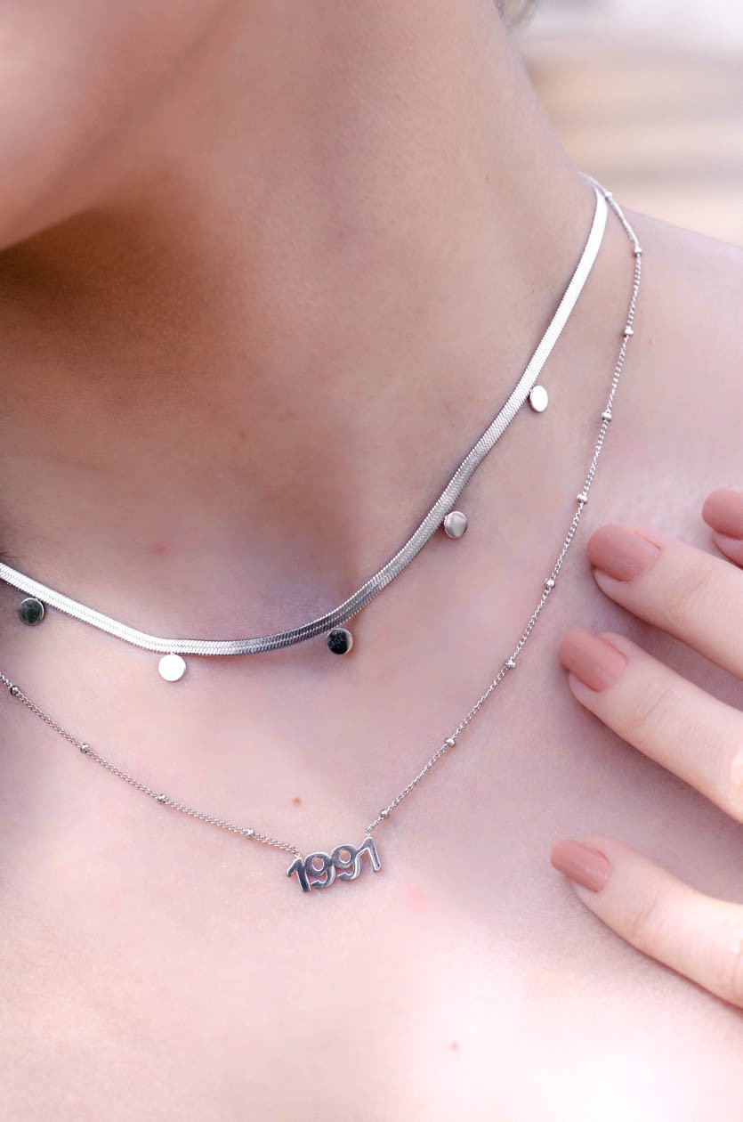 Muntjes ketting snake zilverkleurig