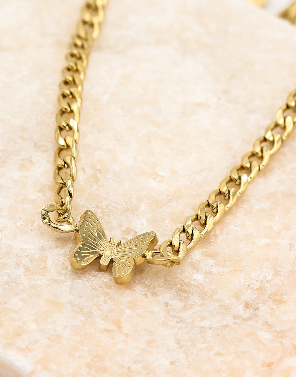 Schakelketting met vlinder goudkleurig
