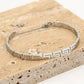 Bangle Z patroon zilverkleurig