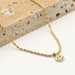 Ketting smiley gedraaid goudkleurig
