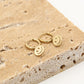 Oorringen smiley goudkleurig