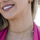 Ketting love met steentje en zoetwater parel goudkleurig
