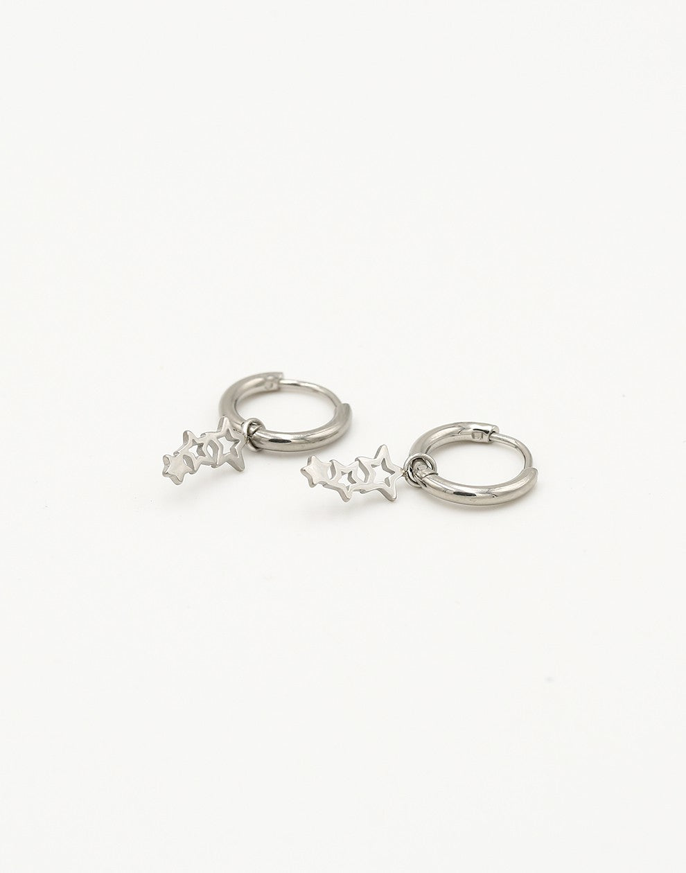 Silver-colored star earrings