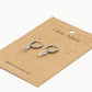 Silver-colored star earrings