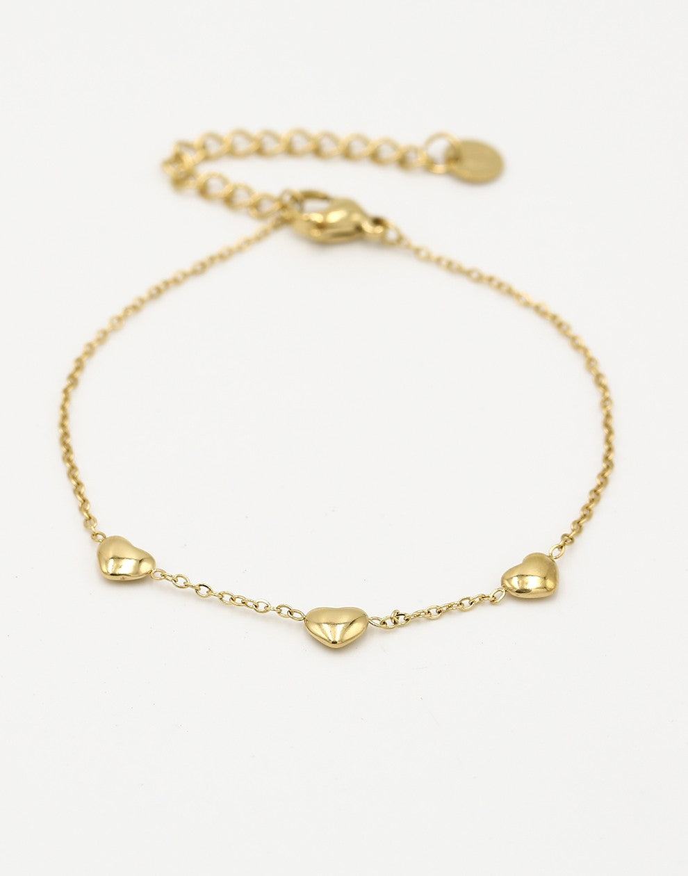 Armband drie hartjes goudkleurig