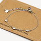 Armband drie hartjes zilverkleurig