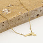 Balletjes ketting pistool goudkleurig