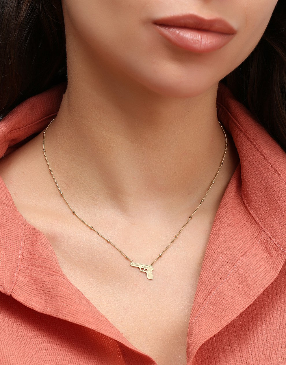 Balletjes ketting pistool goudkleurig