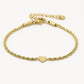 Armband gedraaid met hartje goudkleurig