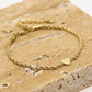Armband gedraaid met hartje goudkleurig