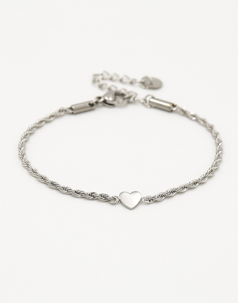 Armband gedraaid met hartje zilverkleurig