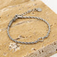 Armband gedraaid met open hartje zilverkleurig