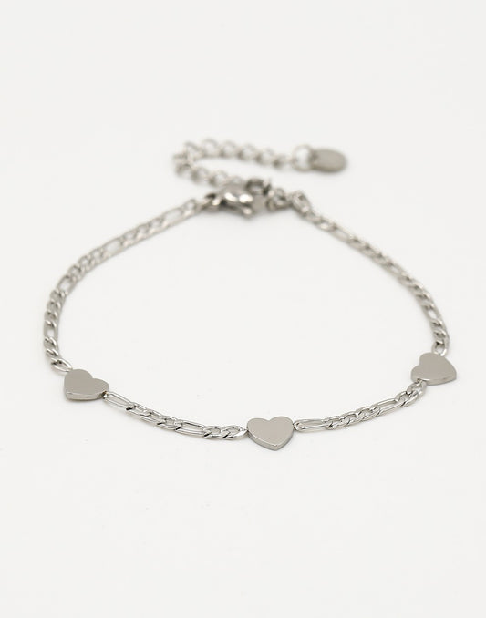 Schakelarmband drie hartjes zilverkleurig
