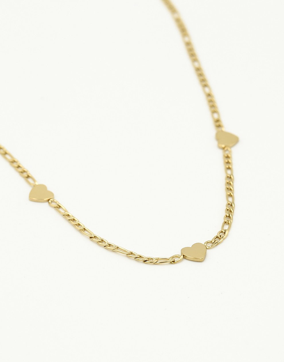 Schakelketting drie hartjes goudkleurig