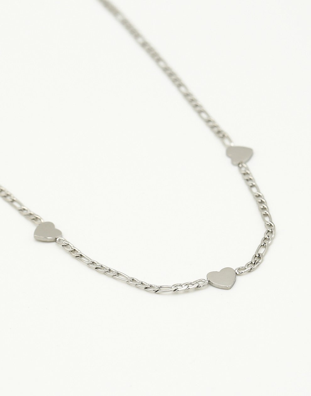 Schakelketting drie hartjes zilverkleurig