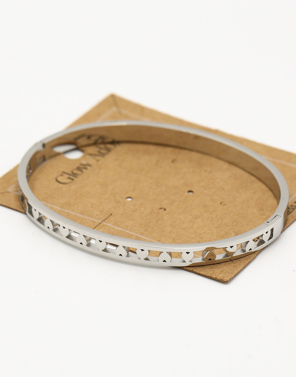 Armband bangle hartjes zilverkleurig
