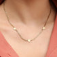 Schakelketting drie hartjes goudkleurig