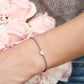 Armband gedraaid met hartje zilverkleurig
