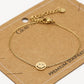 Armband smiley goudkleurig