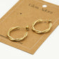 Oorbellen goudkleurig gedraaid 12mm