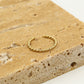 Ring gedraaid goudkleurig