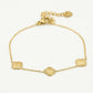 Armband klavers glinster goudkleurig