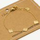 Armband klavers glinster goudkleurig