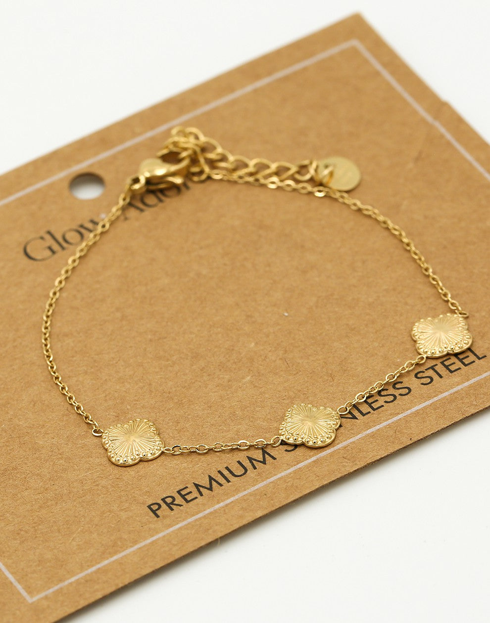 Armband klavers glinster goudkleurig