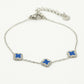 Armband klavers blauw zilverkleurig